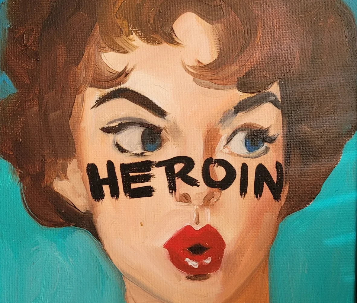 Painted portrait with the word “Heroin” across the subject’s face, symbolizing addiction awareness